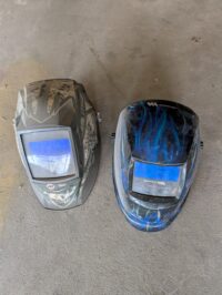 #13 1 Miller and 1 Weldmark welding helmets